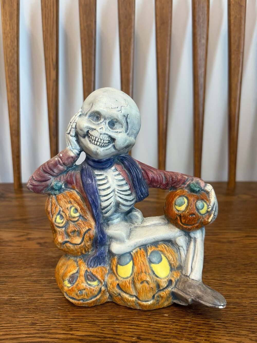 Vintage 1990 Holland Skeleton Sitting on Pumpkins Ceramic Figurine